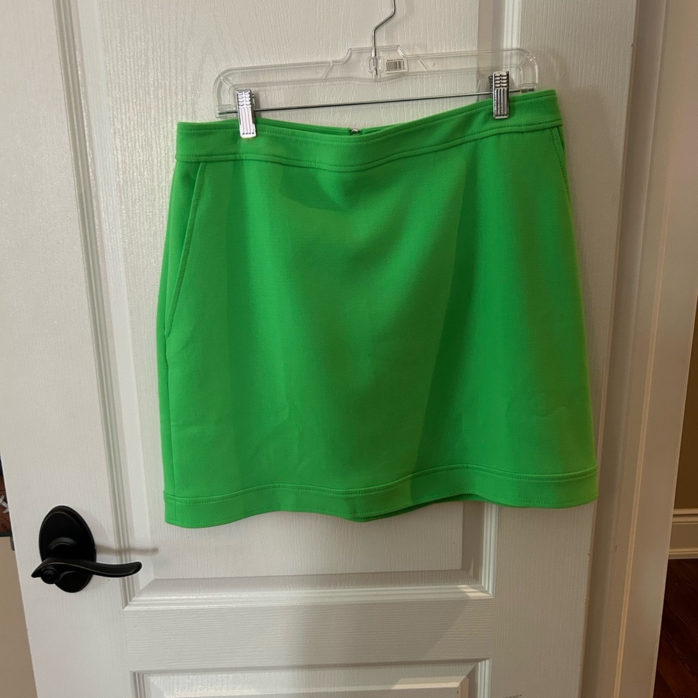 Fun green mini skirt with pockets